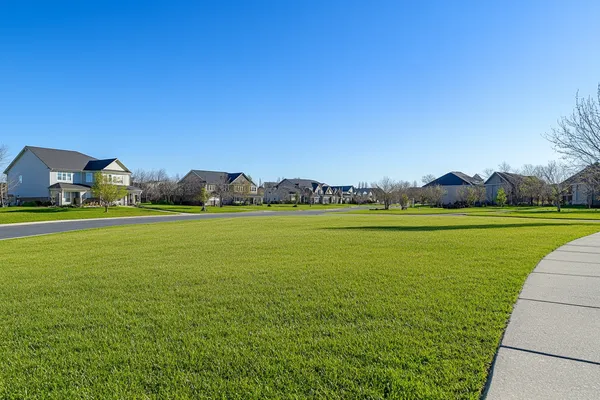 Empty residential lot in a suburban neighborhood